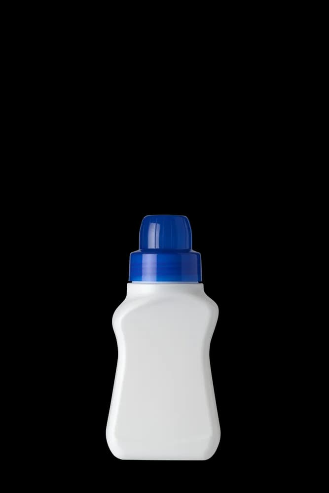 Unlabeled compact pour bottle, white · blue cap